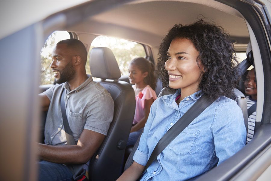 Auto-Insurance-Family-Traveling-Together-on-a-Road-Trip-min