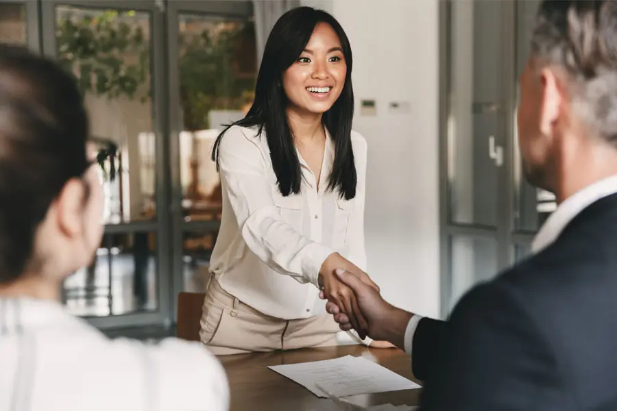 Employment-Practice-Liability-Insurance-Woman-Getting-Hired-for-Her-First-Job